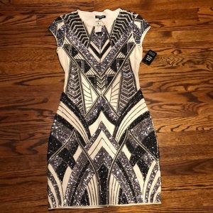Beautiful dress from exspress new . Size xs perfect for the holidays